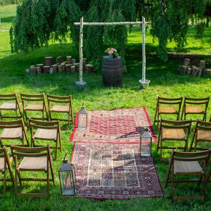 Outdoor wedding ceremony, rustic aisle