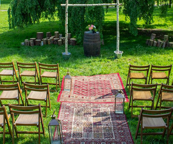 Outdoor wedding ceremony, rustic aisle